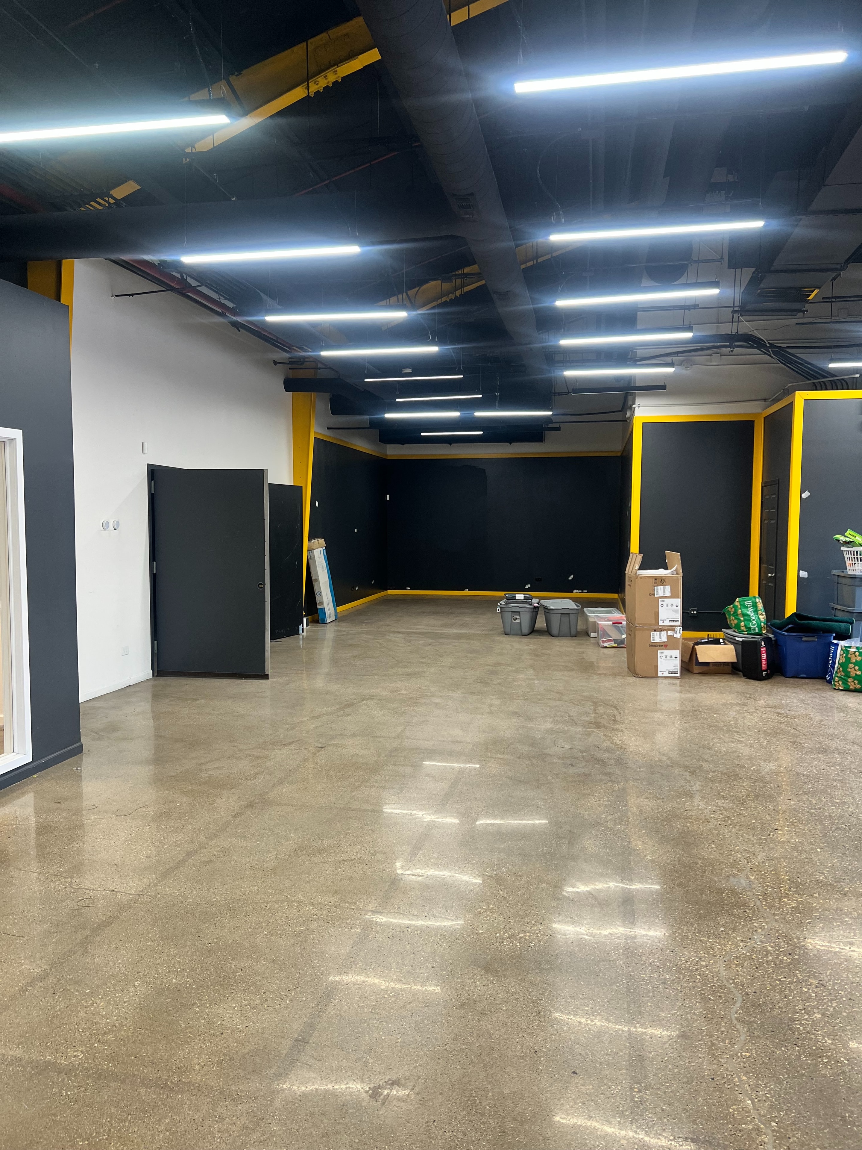 New space — main floor with bright LED lighting